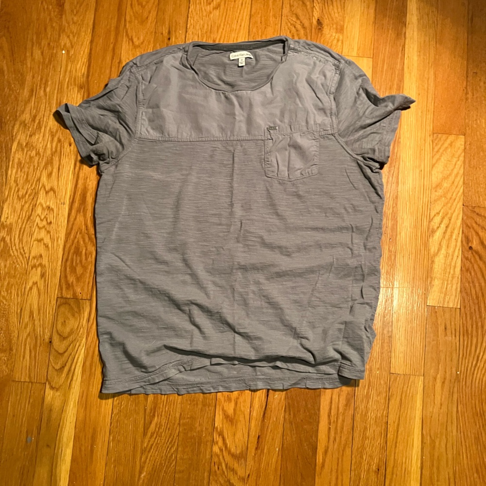 Two Calvin Klein shirts. Size medium. Great condition.